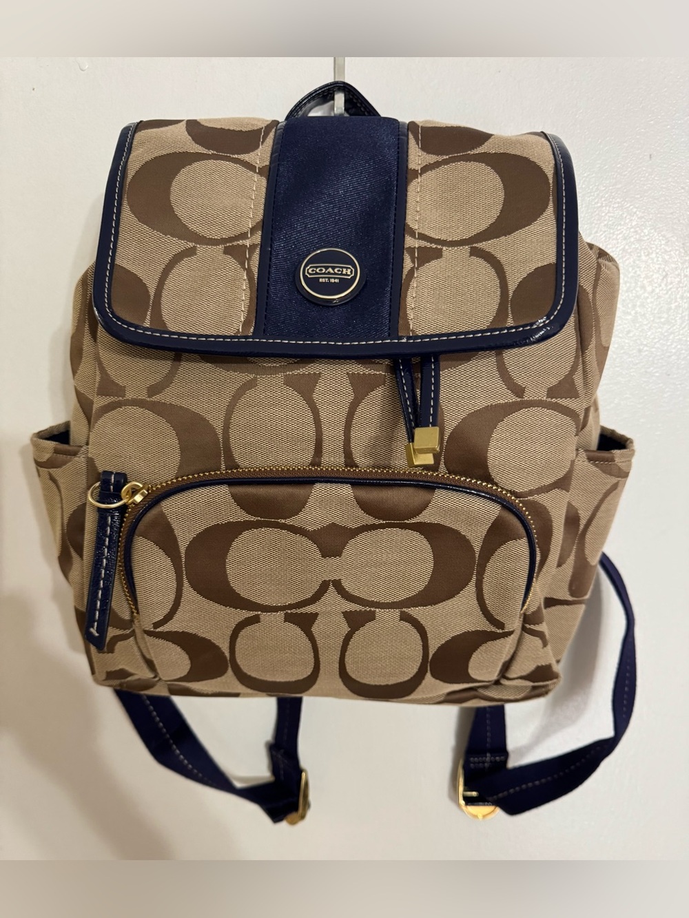 Coach signature monogram backpack in brown & beige with a navy stripe EUC